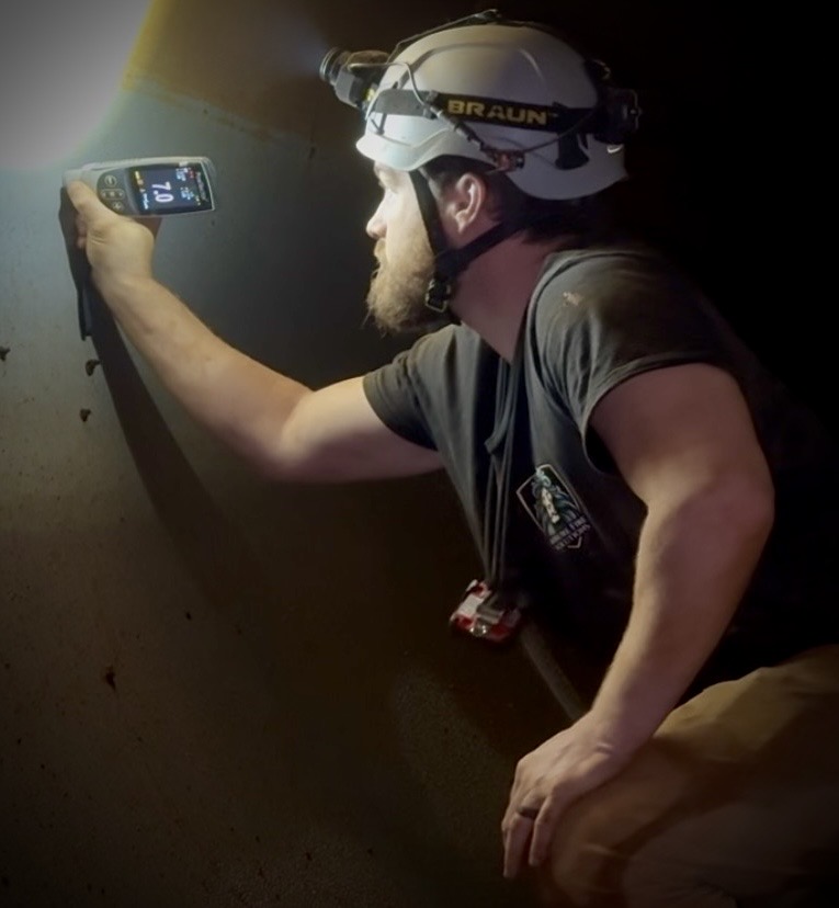 Ultrasonic thickness testing inside a drained fire protection water storage tank